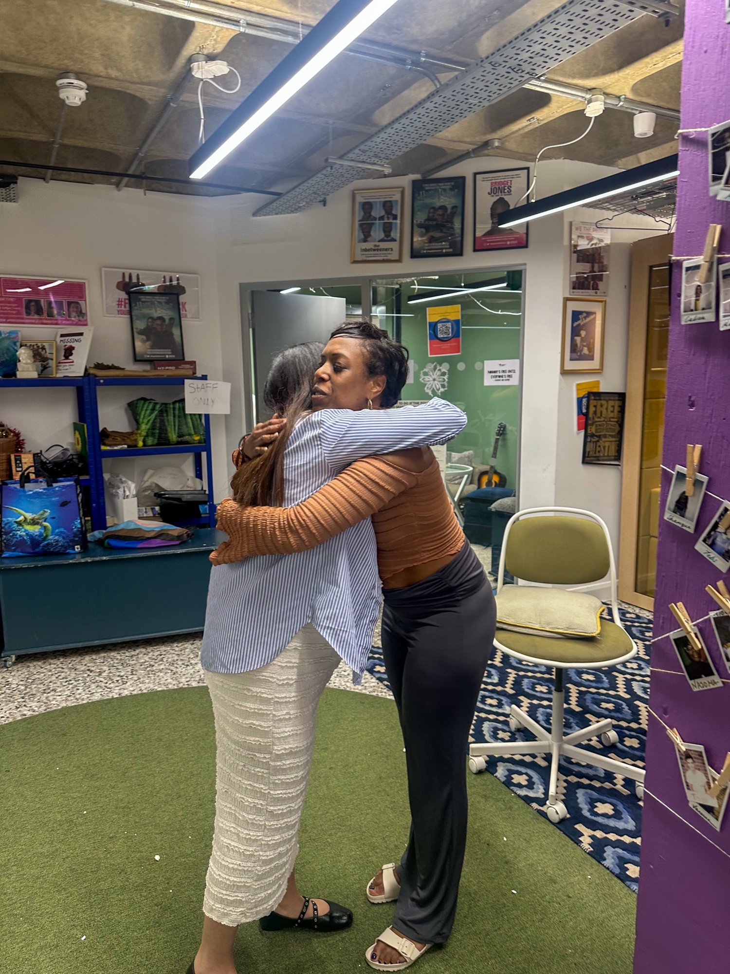 Guests sharing a warm moment at a Birth Loop session